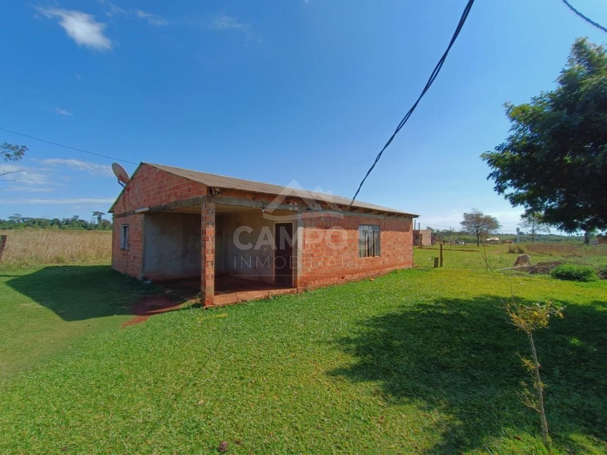 VENDO TERRENO CON CASA A TERMINAR